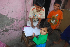 Marziya Teaches the Slum Kids to Write by firoze shakir photographerno1