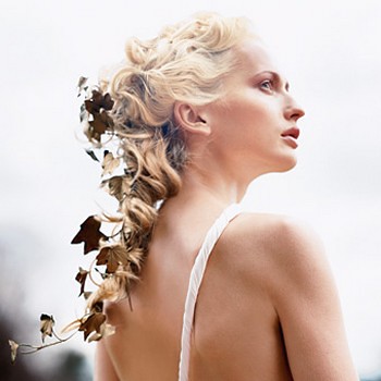 Big curly wedding hairstyle with halfup updo