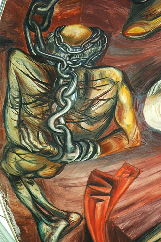 Chained and tortured prisoner, naked, Father Hidalgo in chains, José Clemente Orozco Mural, Governor's Palace, Guadalajara, Jalisco, Mexico by Wonderlane