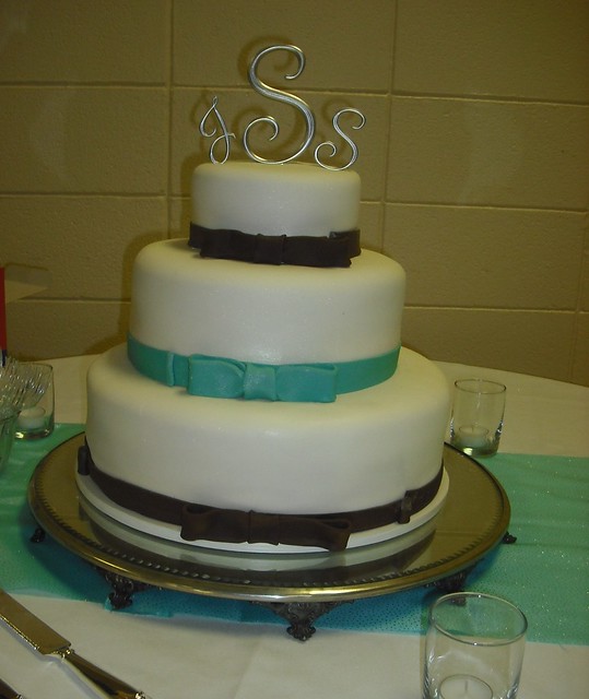 chocolate and teal bow wedding 69 and 12round tiers covered in white 
