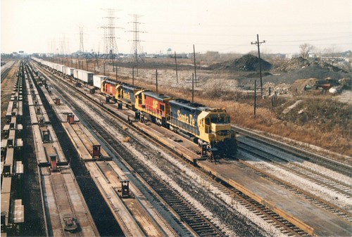 Eastbound Atchinson, Topeka & Santa Fe piggyback train approaching the South Pulaski Road overpass bridge. Chicago Illinois. November 1989. by Eddie from Chicago