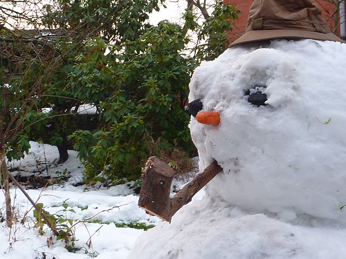 Snow man and his pipe