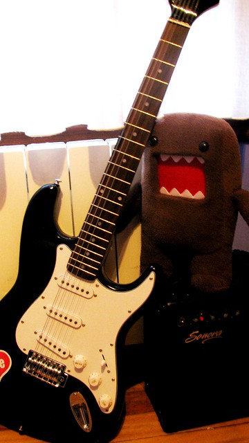 Domo With Guitar