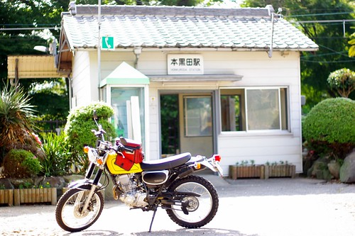My motorbike at local train station by naozo