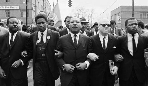 from left: John Lewis, Reverend Jesse Douglas, Martin Luther King, Jr., James Forman and Ralph Abernathy (1965 photo by Steve Schapiro/Corbis, via History.com)