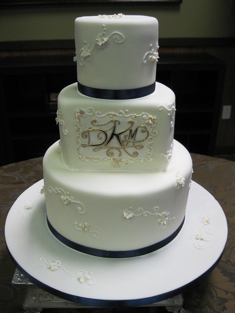 Navy and gold monogram wedding cake wwwstephaniethebakercom