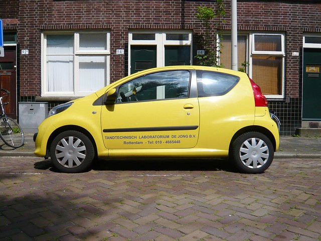 Yellow Peugeot 107 2008