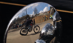 Watching the motorbike parade through a wing mirror...