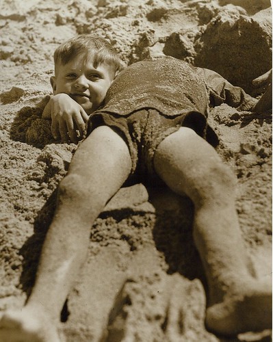 Billy and Graham Green from the Salvation Army Camp practise a little deceit, Collaroy Beach, ca. 1940 / photographer unknown by State Library of New South Wales collection