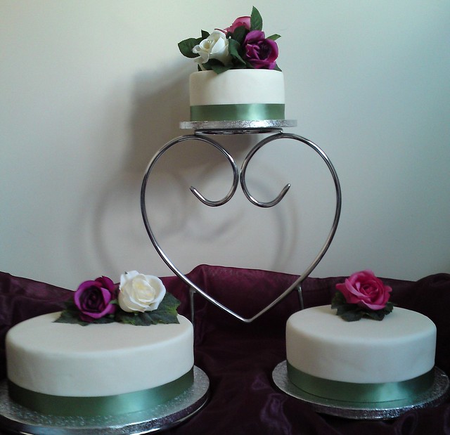 Unusual wedding cake stand with three tiers