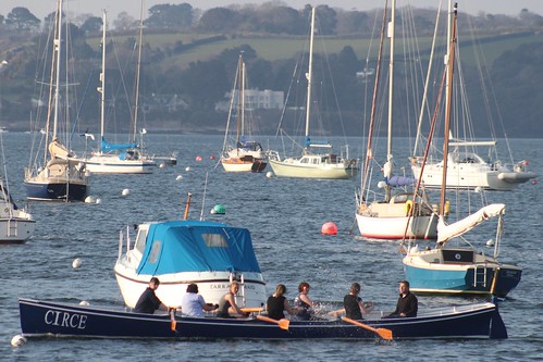 Circe, Cornish Racing Gig arriving back at Mylor Harbour, Carrick Roads (River Fal) by Stocker Images