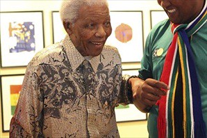 Former South African President, leader of the African National Congress and political prisoner, Nelson Mandela, makes a public appearance on the eve of the opening of the World Cup inside the country. by Pan-African News Wire File Photos