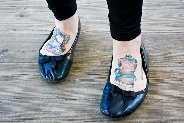 Saw these great tattoos sewing machine dressing dummy on the feet of a 