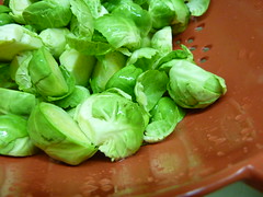 brussel sprouts in red colander