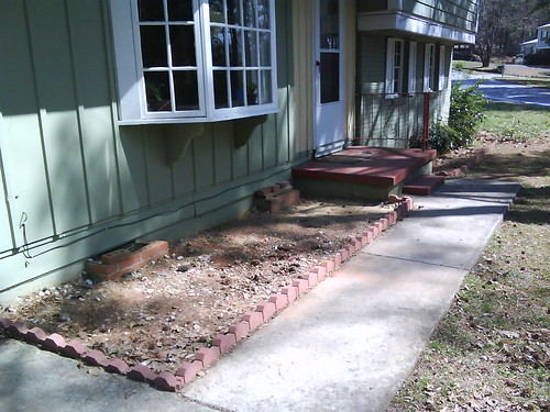 Our cement-free front flowerbed!