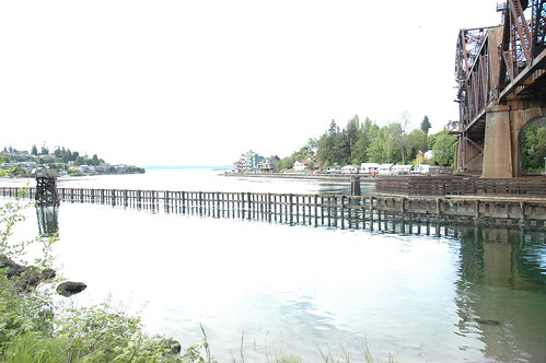 Train bridge, still green waters of Puget Sound, Ballard, Seattle, Washington, USA by Wonderlane