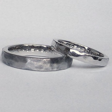 Matching recycled palladium wedding bands that look hammered 