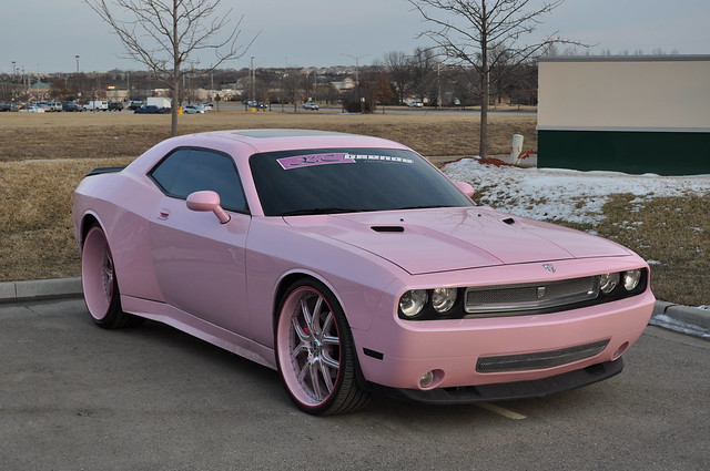 Dodge Challenger with a Pink paint job Wide Body Kit and Custom 26 rims 