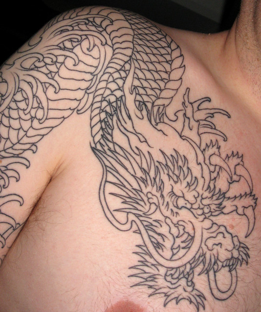 Dragons head and upper body All work completed by Nico from One Love Tattoo