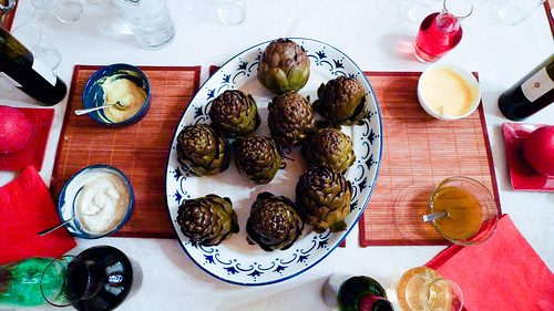 Boiled artichokes and various sauces