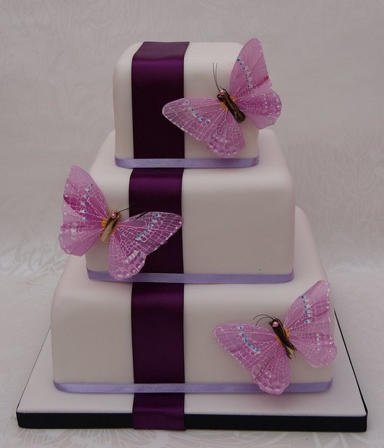 Vertical Butterflies Wedding Cake Inspiration came from a similar style by 