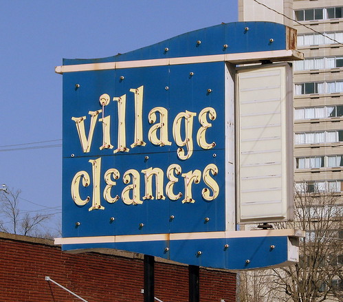 Village Cleaners neon sign