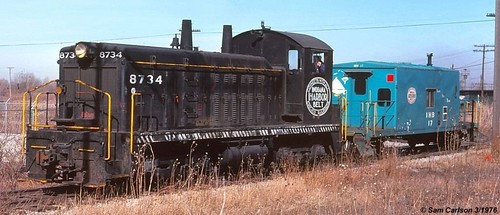 Indiana Harbor Belt Railroad EMD NW-2 # 8734 and a caboose in Hammond Indiana. March 1976. by Eddie from Chicago