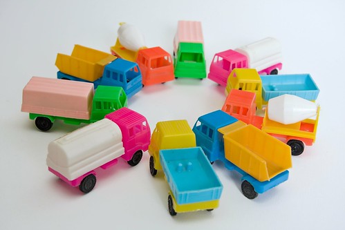 Colorful toy trucks parked in a circle