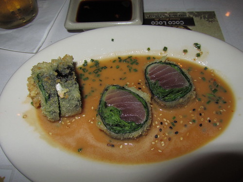 Panko crusted ahi with arugula and spinach in a soy butter sauce.  MMMMMM!