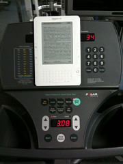 Reading my Kindle on the stair stepper at the gym