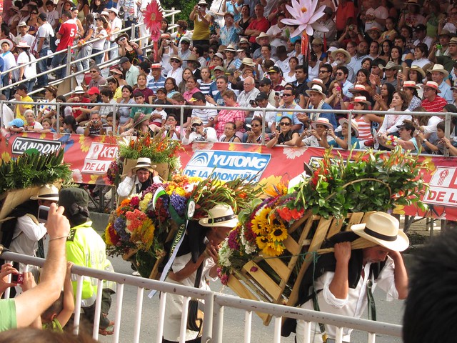 Carrying flowers in the parade does not look easy. At least it was a cloudy day, otherwise the strong sun would've made it that much harder.