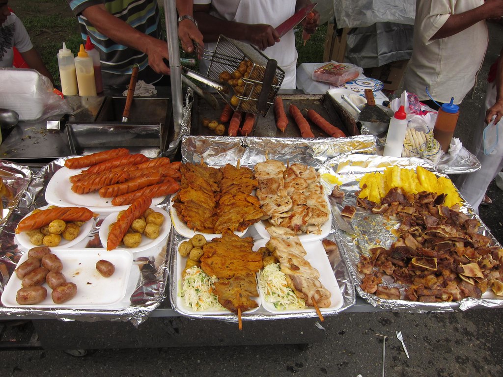 Chicken, meat, potatoes and salad make up the typical plate of street food in Colombia.  You'll find these combinations at every festival, parade and street party.