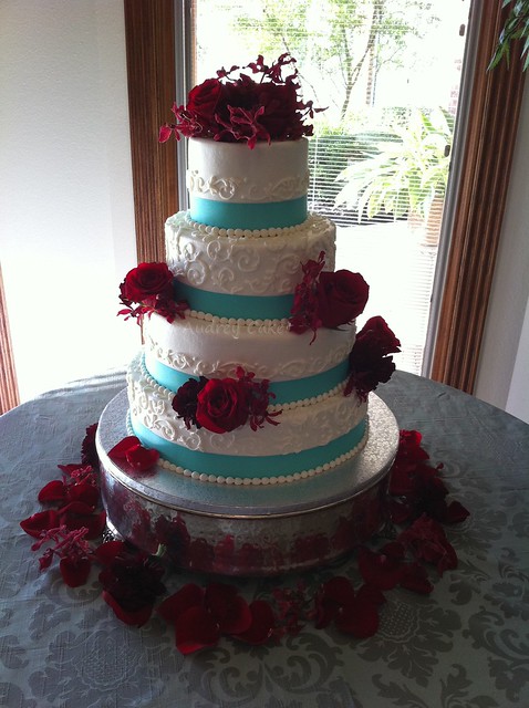 Aqua Red Wedding Cake Unlikely colors combine to beautifully accent this