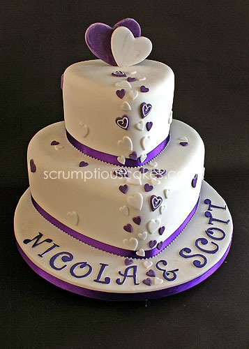 purple wedding cupcakes with hearts