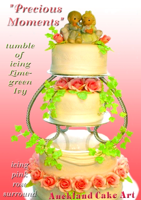 four layer wedding cake featuring precious moments figurine and reverse 