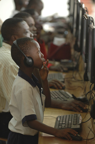 People work on computers at the Busy Internet computer center in Accra