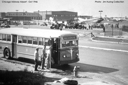 Historic Photo!  Northbound Chicago Surface Lines Company 1940's era White transit bus picking up passengers on South Cicero Avenue and West 61st Street across from Chicago's Midway Airport. Chicago Illinois. October 1946. by Eddie from Chicago