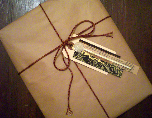 Image of a brown paper package tied up with string