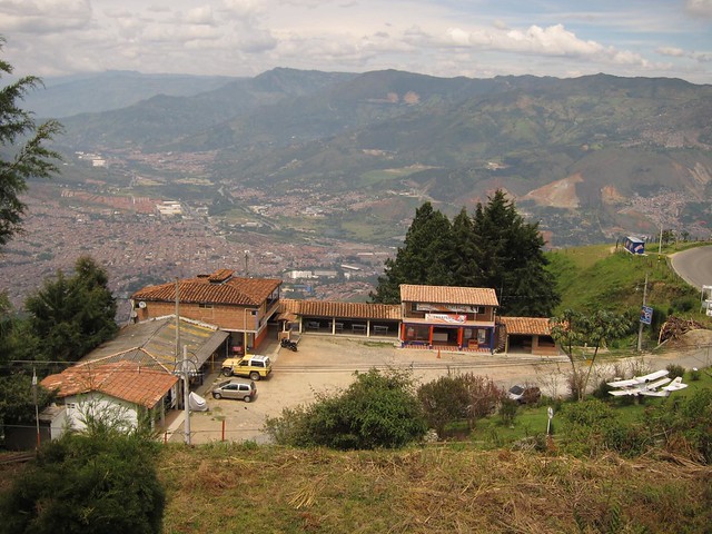 The small collection of paragliding shops perched below the takeoff and landing area.