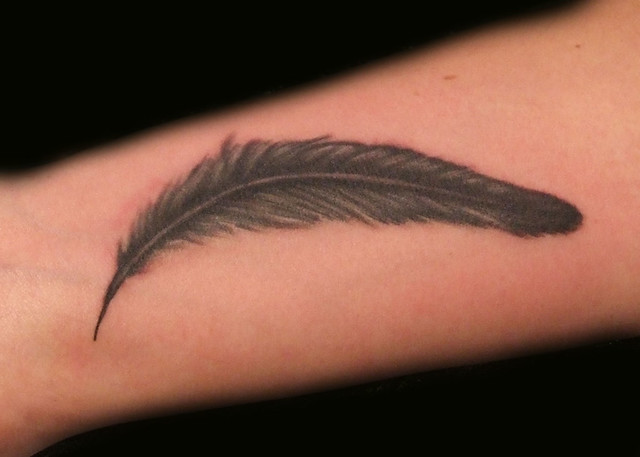 Black and Grey Feather Tattoo Paulo Madeira Tattoo Artist and BodyPiercer