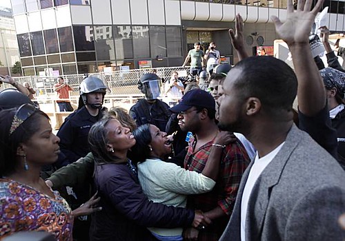Oakland masses outraged at light verdict for white transit cop in the killing of Oscar Grant III. Cops from all over the region poured into streets to stop the rebellion. by Pan-African News Wire File Photos