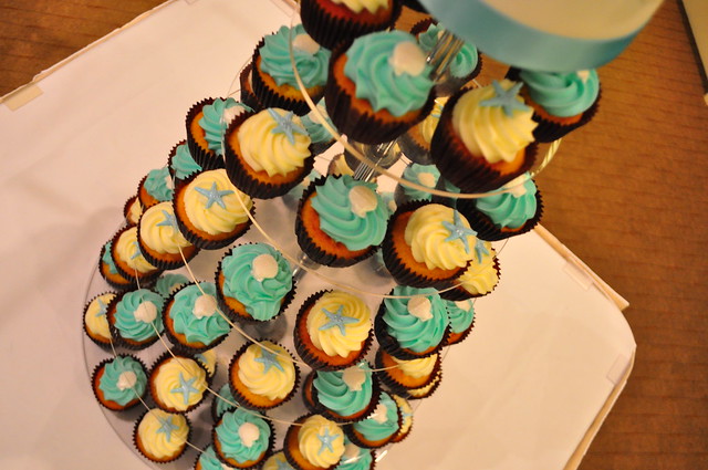 Turquoise and white wedding cupcakes White choc mud cupcakes with piped
