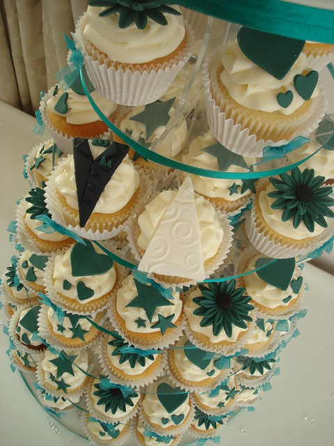 Ivory and Teal wedding cupcake tower Fruit cutting cake on top with teal
