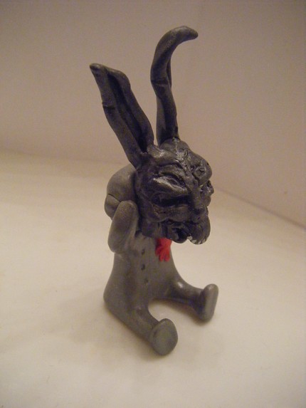 Robot wearing Donnie Darko Frank the Bunny mask Side