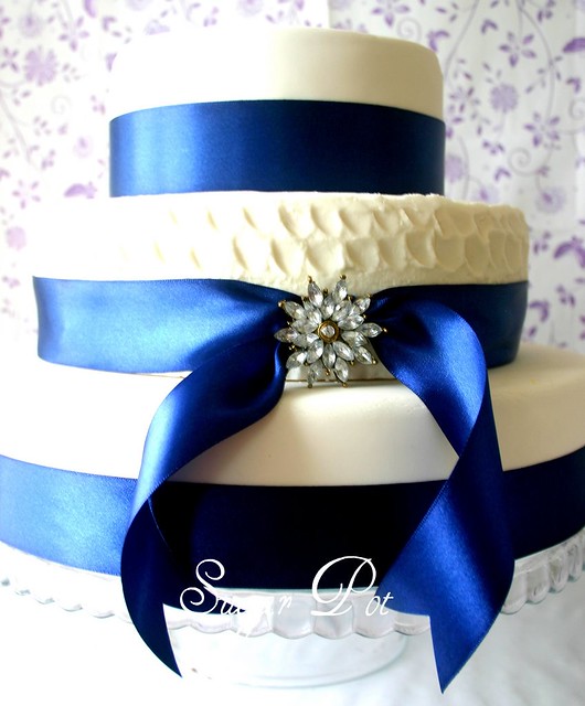 3 tier Royal blue and white wedding cake Top and Bottom tiers traditional 