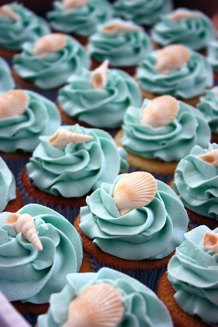 Vanilla Cupcakes with Turquoise Vanilla Buttercream decorated with handmade