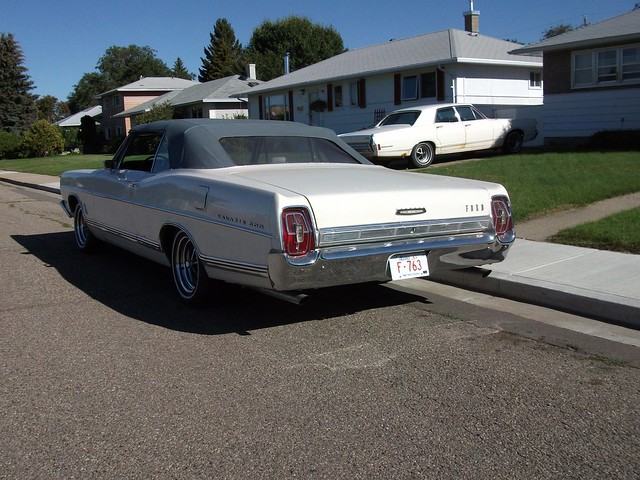 1967 Ford Galaxie 500 Convertible with a 1968 Mercury Montclair in the