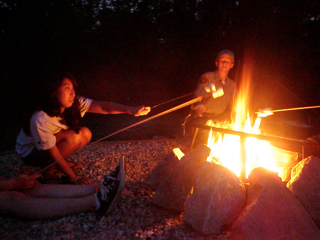 Roasting marshmallows at the campfire