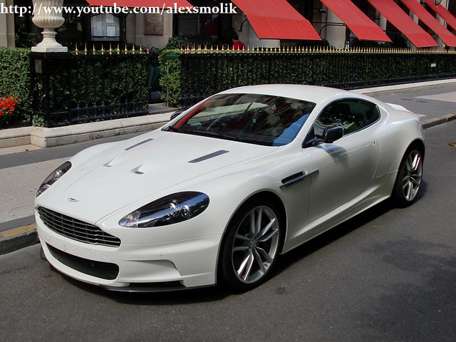 Nice little white Aston Martin DBS with carbon fiber sideview mirror