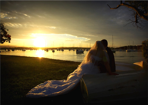 Bride and groom watching the sunset.